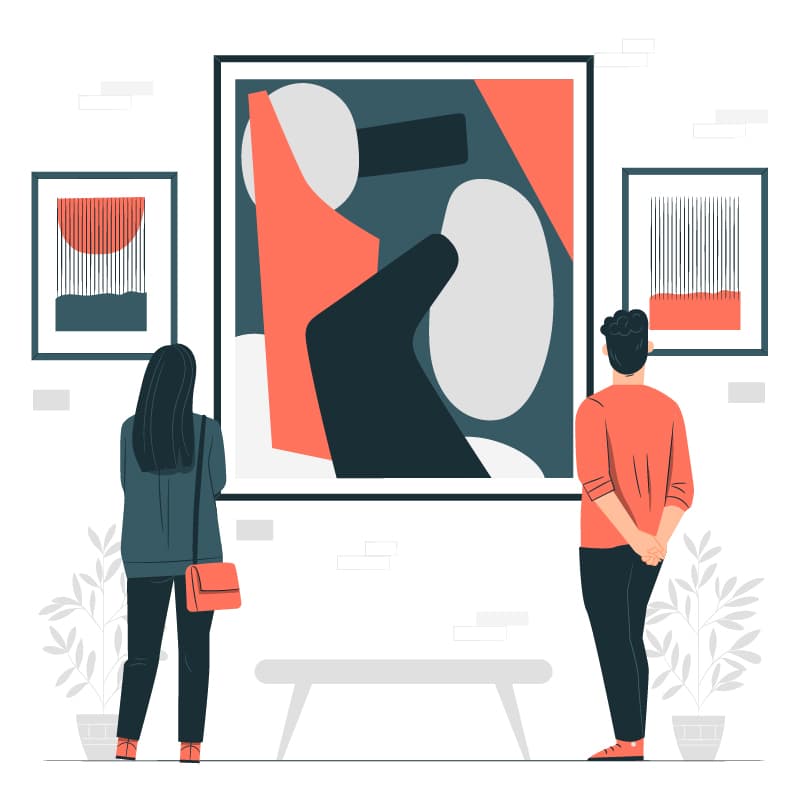 Two people looking at art