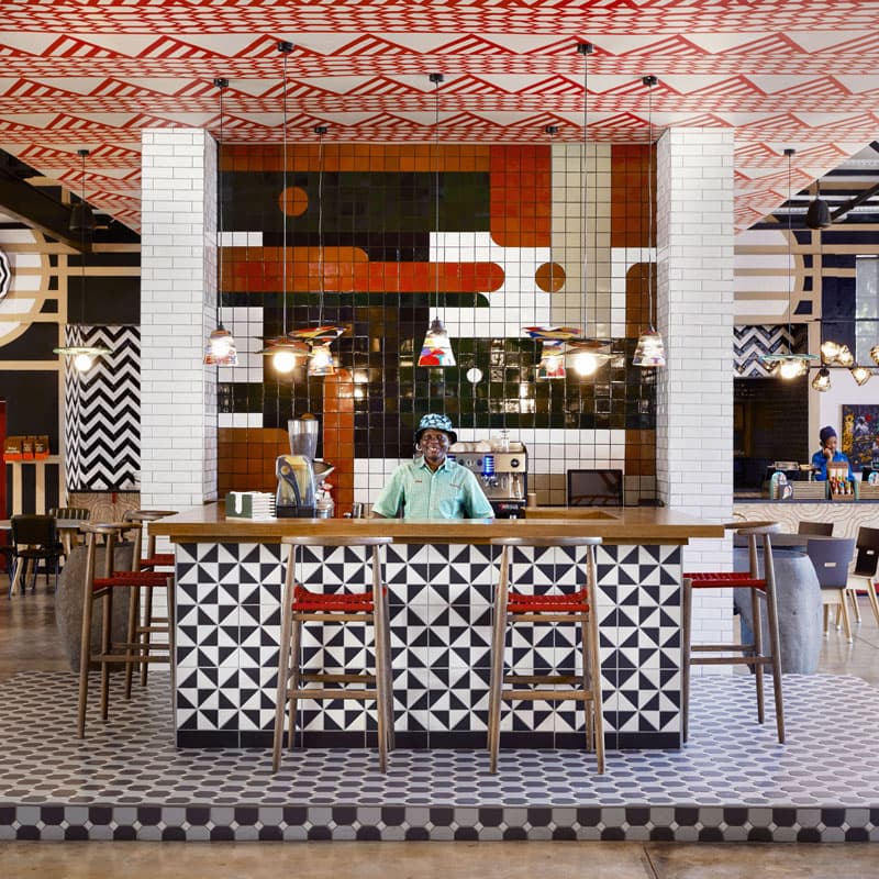 person behind a counter at CK