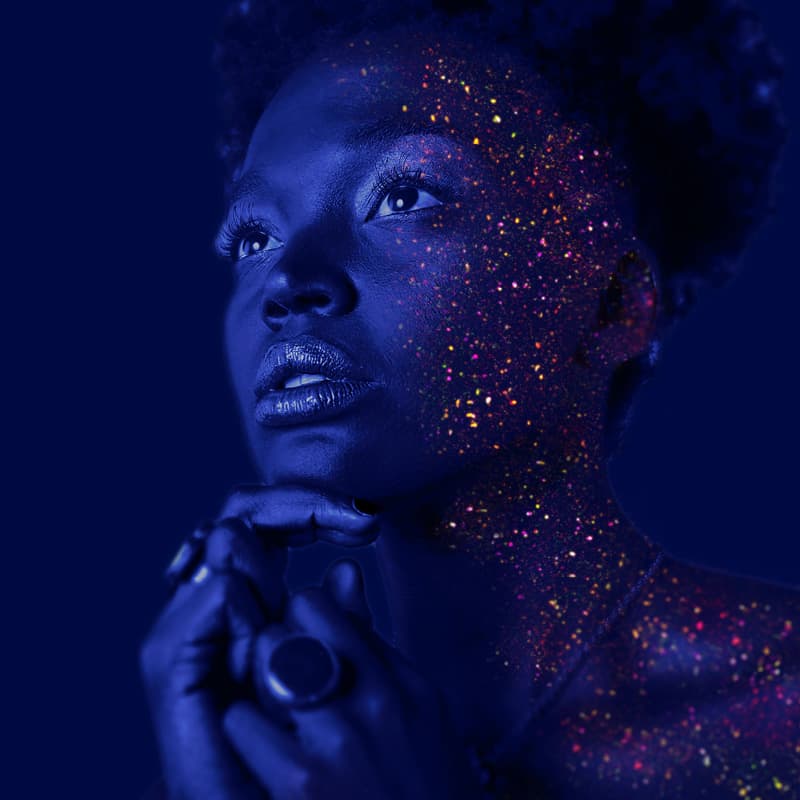 A woman in blue lighthing