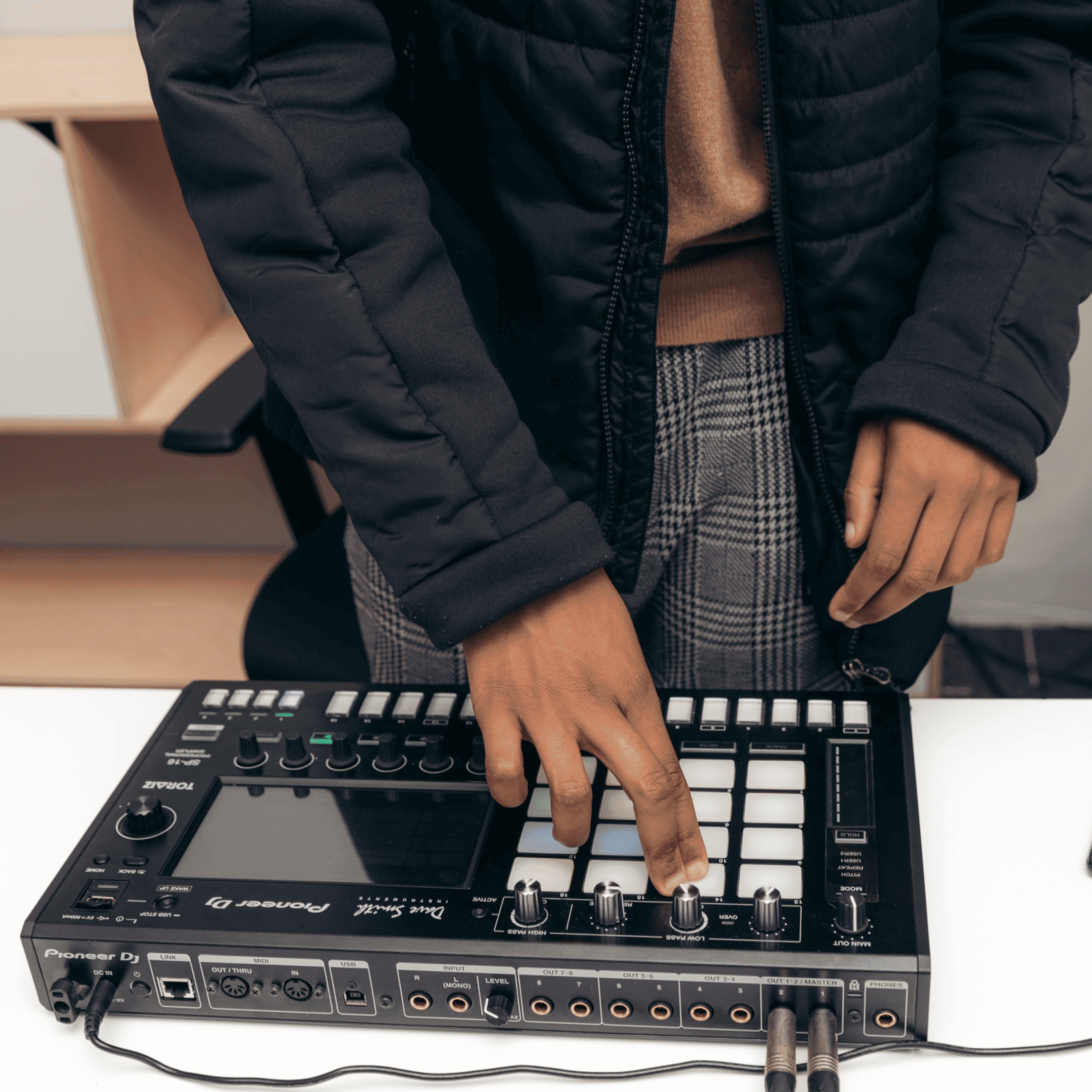 A person playing the soundboard