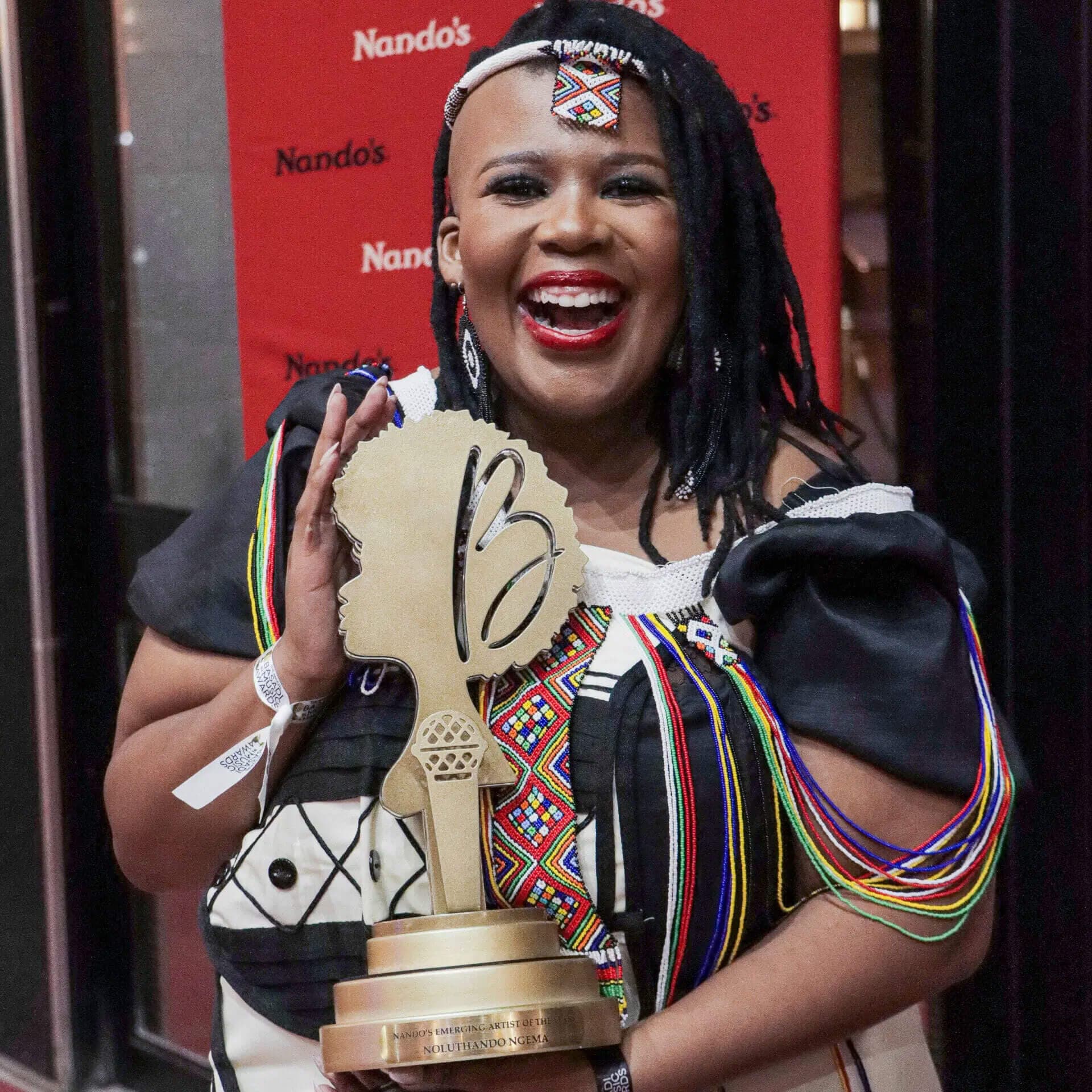 Noluthando Ngema on with her award